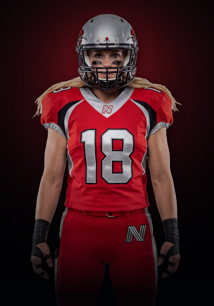 Dallas Apex athlete in a red and silver number 18 jersey